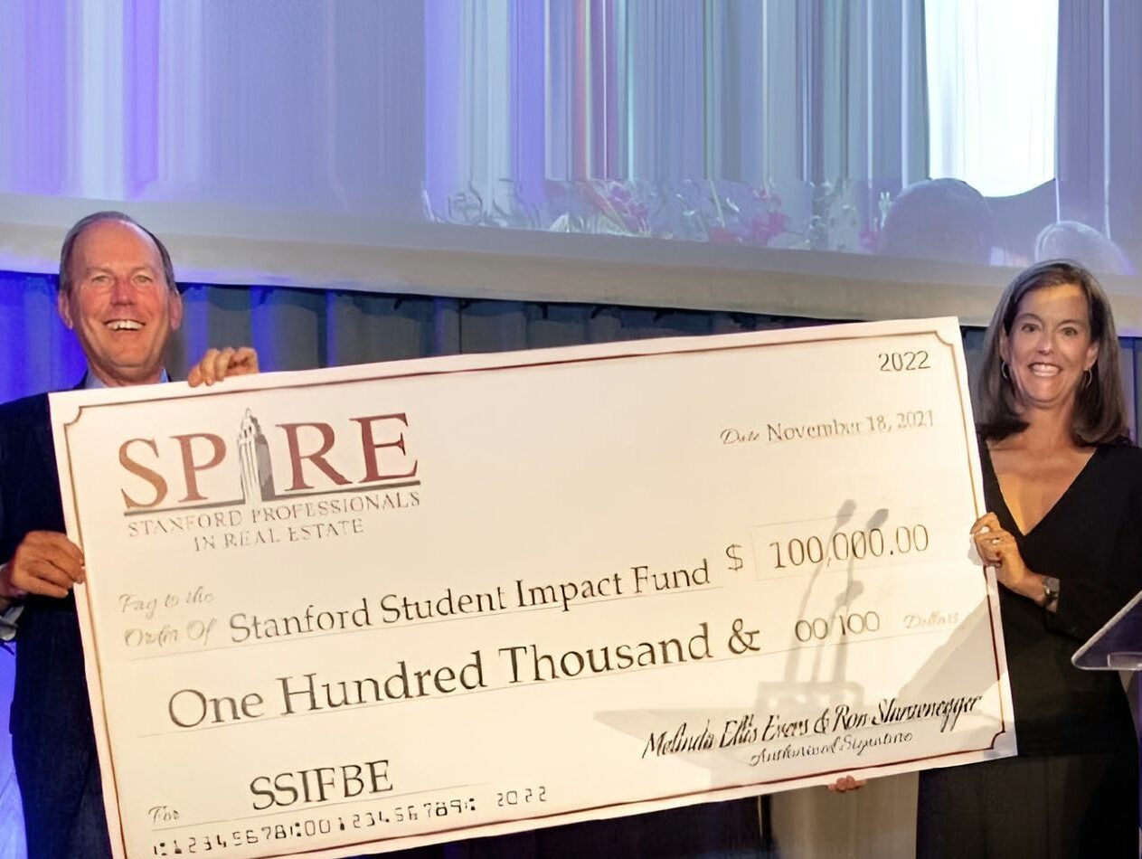 Melinda Ellis Evers (MBA ’93) and Ron Sturzenegger (’82) at their 2021 Stanford Real Estate Hall of Fame induction, where they launched the Stanford Student Impact Fund.